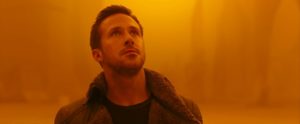 Ryan Gosling stares at the scenery in Blade Runner 2049